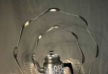 Spoons circling a light by Garbage – upcycleDZINE