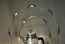 Spoons circling a light by Garbage Spoons circling a light by Garbage – upcycleDZINE
