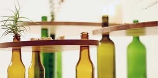 DVINUS: tables out of wood and bottles by Tati Guimarães