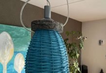 DIY: Wicker planters turned into eco friendly lampshades Wicker lampshade end result above table | upcycleDZINE