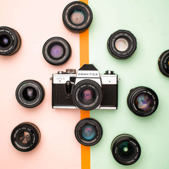 5 Upcycling Ideas for Used Cameras - camera and lens wall | upcycleDZINE