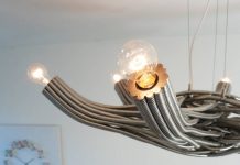 Free-formed flexible steel tubes make up the Flux chandelier Floating Flux chandelier by JAN PAUL in mid air | upcycleDZINE