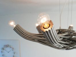 Free-formed flexible steel tubes make up the Flux chandelier Floating Flux chandelier by JAN PAUL in mid air | upcycleDZINE